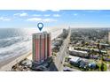 Breathtaking aerial view of a beachfront condo building near the city at 1900 N Atlantic Ave # 1603, Daytona Beach, FL 32118