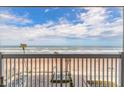 Balcony view showcasing the ocean, beach, and clear blue sky at 2700 N Atlantic Ave # 454, Daytona Beach, FL 32118