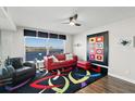 Charming living room with a large window view, sleek furniture, and modern decor at 521 Marina Point Dr # 521, Daytona Beach, FL 32114