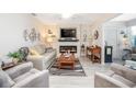 Cozy living room featuring a fireplace, plush seating, and decorative accents at 101 Grand Plaza Dr # M1, Orange City, FL 32763
