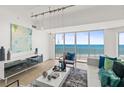 Bright living room with ocean view, modern decor, stylish furniture, and contemporary lighting fixtures at 1900 N Atlantic Ave # 504, Daytona Beach, FL 32118