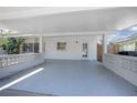 Spacious carport with white brick and covered area at 140 E Faith Ter, Maitland, FL 32751