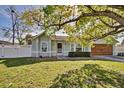 Charming single story home featuring a well-kept lawn and tidy front garden at 1533 Legend Ct, Deltona, FL 32738