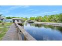 Scenic waterfront view from the dock along a tranquil canal at 24919 Drive No 1, Astor, FL 32102