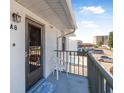 Private balcony with exterior entrance features, including a welcome mat and building views at 3620 Cardinal Blvd # 80, Daytona Beach, FL 32118