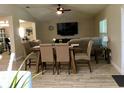 Spacious living room with tile floors, modern furnishings, and plenty of natural light at 112 Grande Lake Dr, Daytona Beach, FL 32124