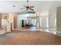 Inviting foyer with an open view to the dining area and kitchen, creating a seamless flow at 1490 Kettledrum Trl, Enterprise, FL 32725