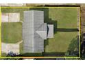 Aerial view of the property showcasing the home's layout, lot size, and surrounding landscape at 2415 India Palm Dr, Edgewater, FL 32141