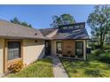 Attractive home showing the roofline, siding, and landscaping around the front of the property at 210 Sage Brush Trl, Ormond Beach, FL 32174