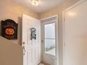 Inviting entryway with a coastal-themed decor creates a welcoming ambiance upon arrival at 2480 Ocean Shore Blvd # 120, Ormond Beach, FL 32176