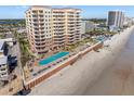 Stunning beachfront condo with pool, hot tub, and lounge area overlooking the ocean, perfect for relaxation at 2515 S Atlantic Ave # 509, Daytona Beach, FL 32118