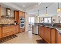 Well-equipped kitchen features stainless steel appliances, granite countertops, and ample cabinet space at 2515 S Atlantic Ave # 509, Daytona Beach, FL 32118