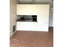 Spacious living room area with tile flooring and open pass-through to the kitchen at 2684 Candler Dr, Deltona, FL 32725