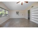 Bright living room featuring a ceiling fan, neutral walls, and windows with natural light at 782 Valencia Ave, Orange City, FL 32763