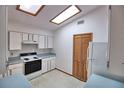 Bright kitchen with skylights, ample storage, and modern appliances at 1167 Peachtree Rd, Daytona Beach, FL 32114