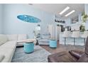 Bright living room featuring stylish furniture, modern decor, and an open layout at 13944 Huntwick Dr, Orlando, FL 32837