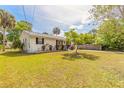 Well-maintained home with a spacious yard, attractive landscaping, and a classic suburban charm at 2605 Fairmont Ave, New Smyrna Beach, FL 32168