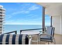 Balcony with seating offers stunning ocean views from this beachfront condominium at 2900 N Atlantic Ave # 2003, Daytona Beach, FL 32118