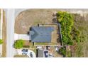 Overhead aerial shot showing the house, roof, and fenced-in backyard at 999 Trumbull St, Deltona, FL 32725