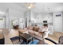 Open-concept living area with seamless flow into the dining room and kitchen at 1601 Toledo Ave, Deltona, FL 32725