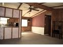 Open-concept living area with adjacent kitchen, ideal for entertaining and everyday living at 34416 Oak Ave, Leesburg, FL 34788