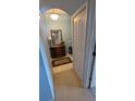 Inviting foyer featuring tile flooring, elegant decor, and neutral wall color at 913 Lake Lindley N Dr, Deland, FL 32724