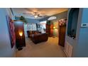 Spacious living room with high ceilings, neutral walls, and stylish furnishings at 913 Lake Lindley N Dr, Deland, FL 32724