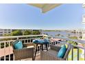 Condo balcony with seating area and lovely views of the water and the bridge at 100 Silver Beach Ave # 716, Daytona Beach, FL 32118