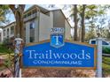 Trailwoods Condominiums sign with the address on a sunny day at 2706 Oak Trail Run # 6, Port Orange, FL 32127