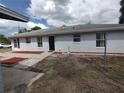 This home shows great curb appeal, with its neutral paint scheme and meticulously landscaped surroundings at 540 W Mathis Ave, Deland, FL 32720