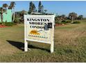 Kingston Shores Condos sign on a sunny day in a grassy area at 5500 Ocean Shore Blvd # Ut18, Ormond Beach, FL 32176