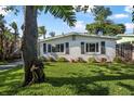 Well-maintained lawn and simple landscaping enhance the curb appeal of this cozy home at 82 Margaret Rd, Ormond Beach, FL 32176
