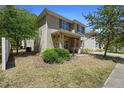 Attractive two-story home featuring classic shutters and a cozy, covered front entryway at 1655 Pham Dr, Port Orange, FL 32129
