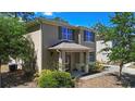 Inviting two-story home boasts a charming covered entrance and well-maintained surroundings at 1655 Pham Dr, Port Orange, FL 32129