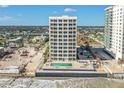 Stunning aerial view of condo featuring pool and easy beach access at 2071 S Atlantic Ave # 705, Daytona Beach, FL 32118