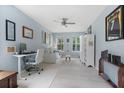 Bright bedroom featuring neutral paint, ample natural light, and versatile furniture at 3451 Luna Bella Ln, New Smyrna Beach, FL 32168