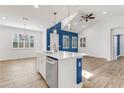 Open-concept kitchen featuring an island with stainless steel appliances, and vaulted ceiling at 484 Landshark Blvd, Daytona Beach, FL 32124
