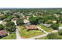 Sprawling home and lawn in a green community, offering a serene residential environment at 585 Summerhaven Dr, Debary, FL 32713
