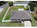 Aerial view of the home showcasing the fenced-in yard and backyard shed at 116 Neal Dr, Deltona, FL 32738