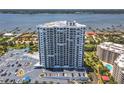 Striking exterior shot of a high-rise condo building with panoramic views of the marina at 2 Oceans West Blvd # 1007, Daytona Beach, FL 32118