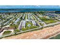 Scenic aerial view of the Ormond Breakers Condominium complex with a refreshing pool near the ocean at 2100 Ocean Shore Blvd # 1120, Ormond Beach, FL 32176