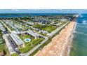Expansive aerial view showcasing the proximity of the Ormond Breakers Condominium to the beach at 2100 Ocean Shore Blvd # 1120, Ormond Beach, FL 32176