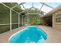 Inviting screened-in pool area, perfect for relaxation and recreation, with ample space for outdoor seating at 8231 Sw 79Th Ct, Ocala, FL 34476