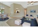 Open concept features living and dining areas with modern decor and neutral colors at 941 Village Lake N Dr, Deland, FL 32724