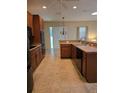 Kitchen with stainless steel appliances, plenty of counter space and a breakfast bar area at 139 Crawl Key Ct, Deland, FL 32720