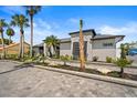 Inviting home exterior with manicured landscaping and a brick driveway at 1446 Stone Trl, Enterprise, FL 32725
