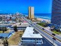 Aerial view of the city and its beaches with hotels and hi-rise condo buildings at 2101 N Atlantic Ave # 10, Daytona Beach, FL 32118
