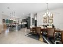 View of the open concept kitchen, dining room, and living space at 2814 S Asciano Ct, New Smyrna Beach, FL 32168