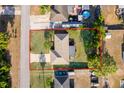 Aerial view of a single-story home shows the property line and surrounding neighborhood at 3107 Mapleshade St, Deltona, FL 32738