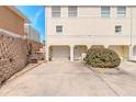Townhome exterior with garage, driveway, and well-kept landscaping at 3733 Cardinal Blvd # 1, Daytona Beach, FL 32118